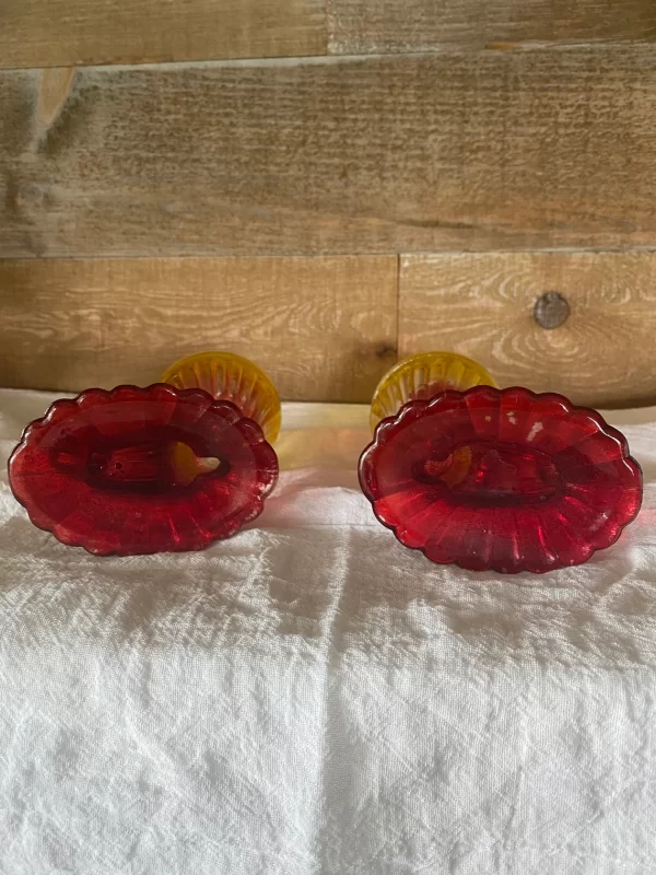 red and yellow glass vase tops