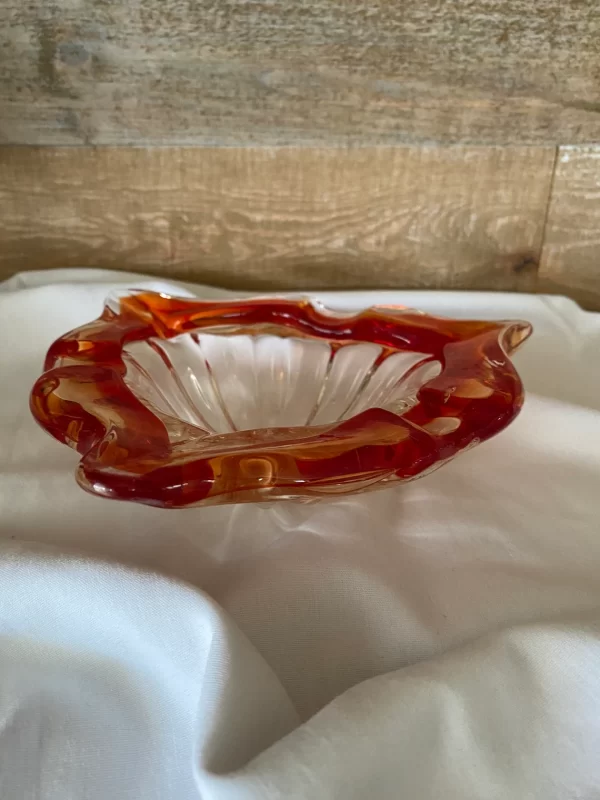 Red glass cigar ashtray from side