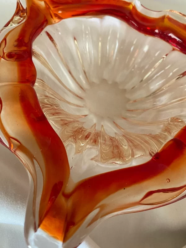 Red glass cigar ashtray top view