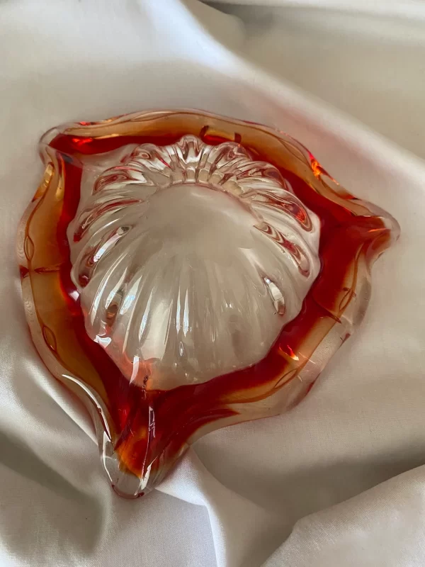 Red glass cigar ashtray bottom view