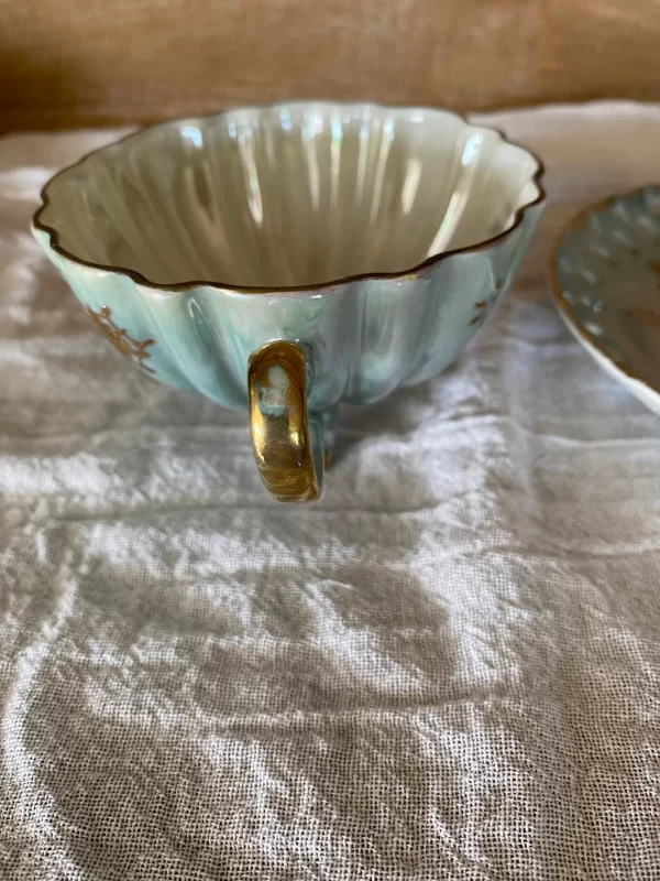 Lefton china hand painted tea cup and saucer blue with gold snowflakes tea cup handle showing slight wear to gold