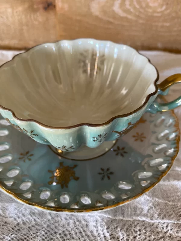 Lefton china hand painted tea cup and saucer blue with gold snowflakes inside tea cup