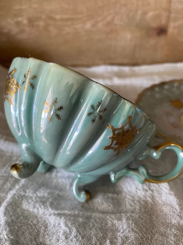 Lefton china hand painted tea cup and saucer blue with gold snowflakes tea cup on side