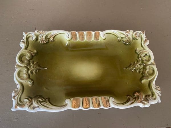 Japan ashtray olive green with white scrolling trim, rectangle 1950s top view