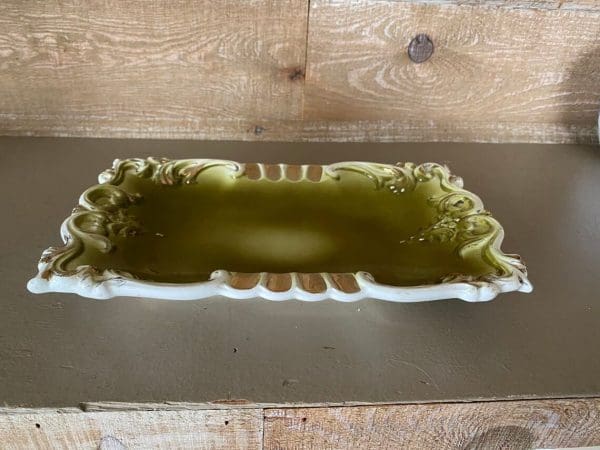 Japan ashtray olive green with white scrolling trim, rectangle 1950s standard front view