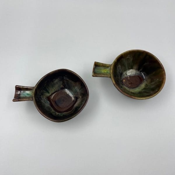 vintage pottery bowls top view showing inside green and brown pottery