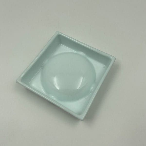 milk glass ashtray bottom