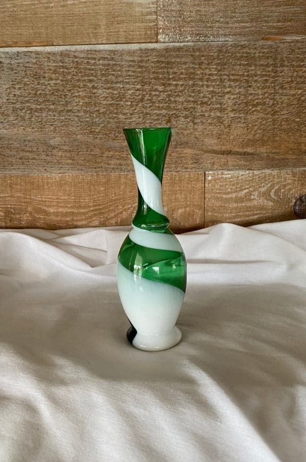 vintage small green glass vase turned