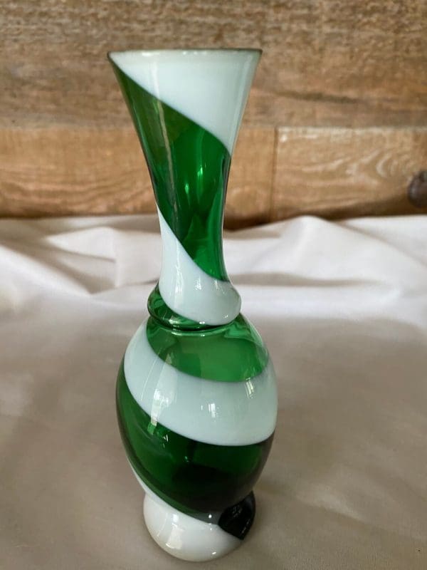 vintage small green glass vase close of top