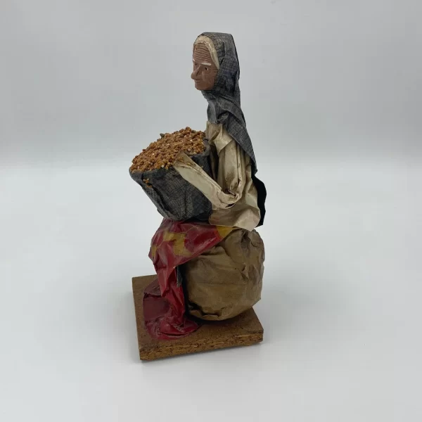 vintage Mexican paper mache figurines lady side