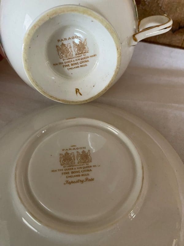 Paragon tea cup and saucer floral showing bottoms with double warrant in brown