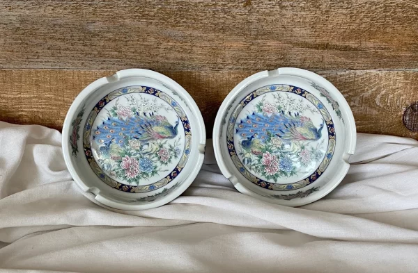 Peackock ashtrays vintage set of two porcelain side view leaning on wall