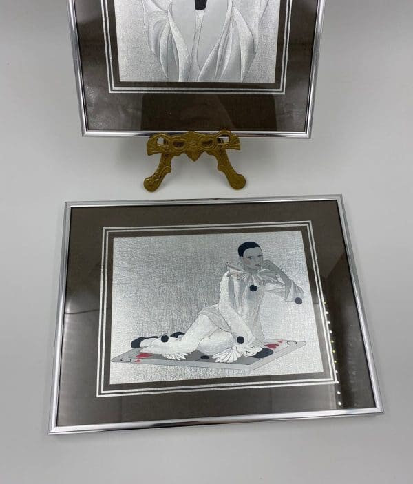 vintage foil art close of second in the pair a mime clown sitting on floor