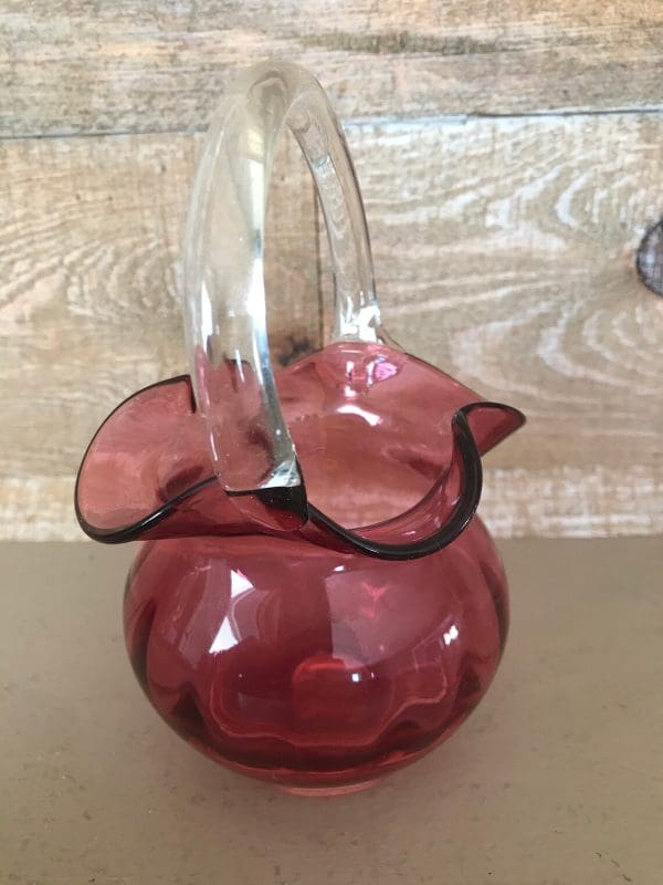 pink glass basket left side clear glass handle