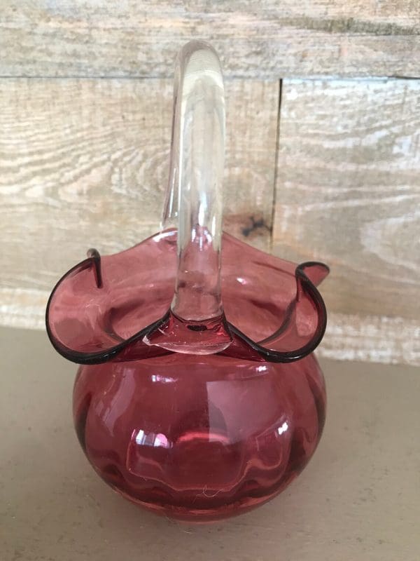 pink glass basket right side clear glass handle