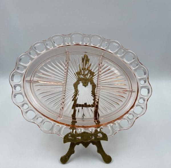 pink depression glass platter on stand