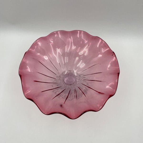 glass pedestal bowl top view of pink glass bowl