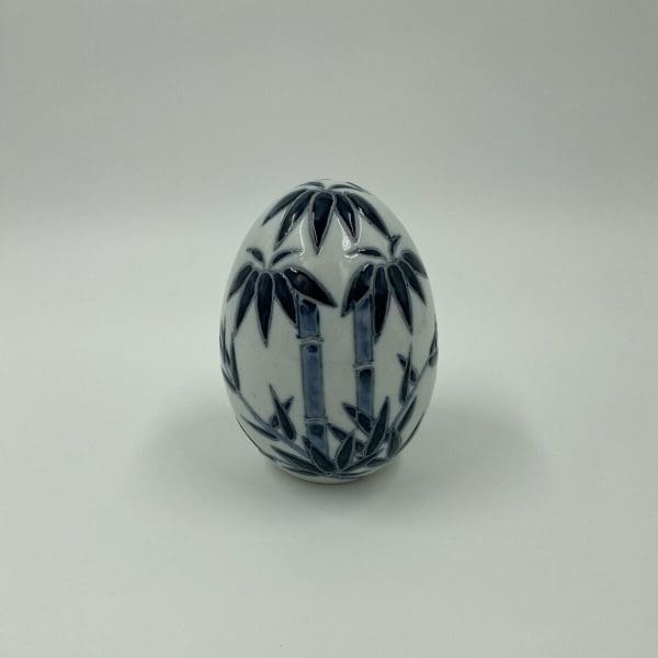 vintage porcelain eggs white with blue trees