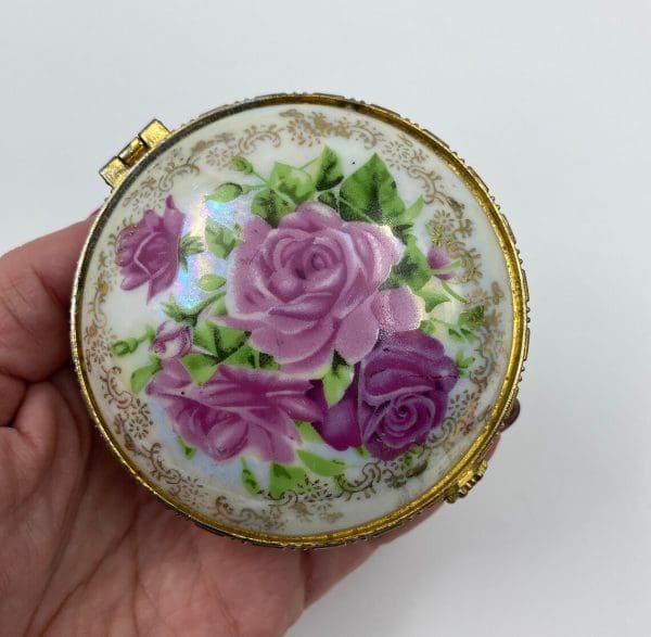 vintage trinket dish in hand to show size