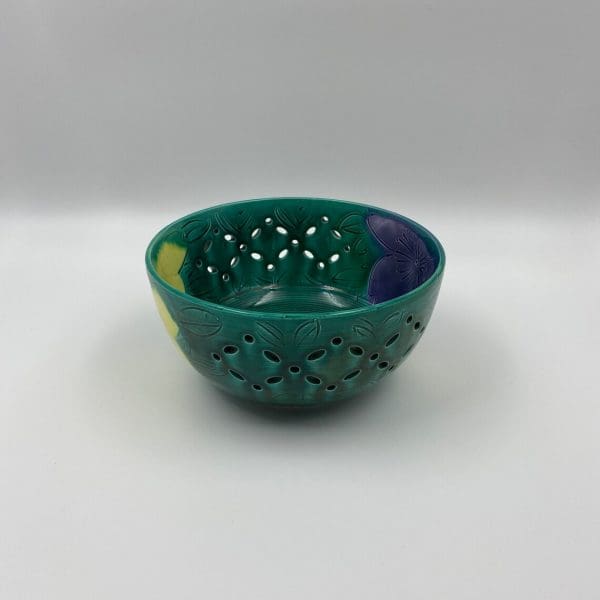 vintage green pottery bowl pierced