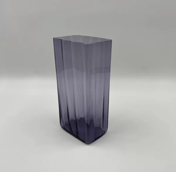 large purple glass vase right edge