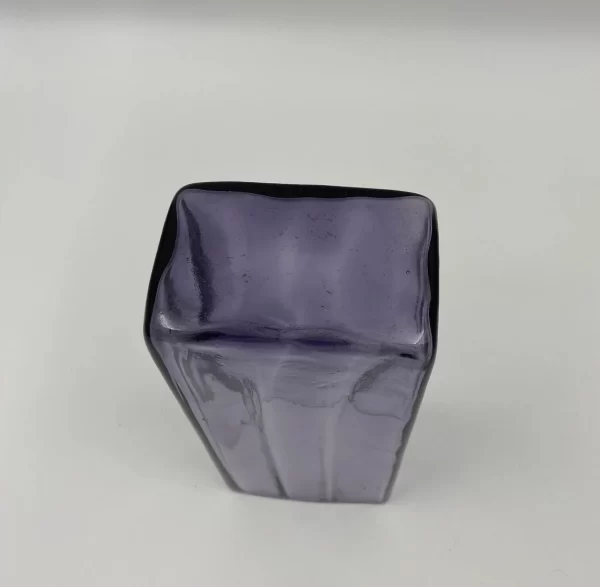 large purple glass vase bottom