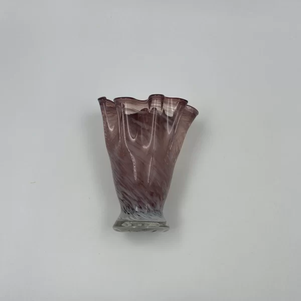 purple glass vase vintage laying