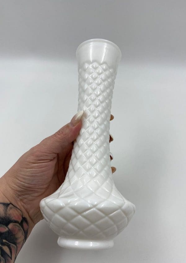 vintage white milk glass vase in hand