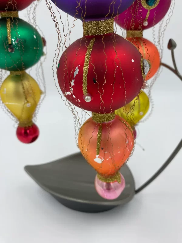 rare Christopher Radko ornaments showing some paint loss