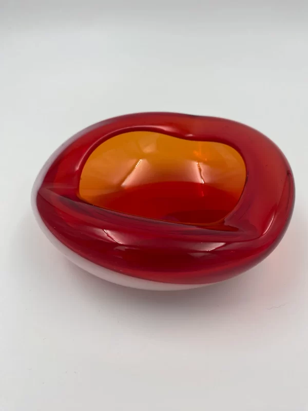 Red glass round ashtray red and white vintage 1980s top view