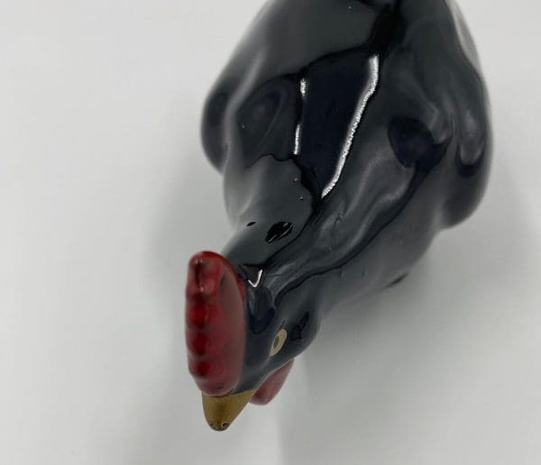 black ceramic rooster head red crown