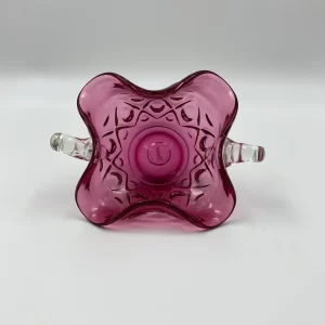 pink glass bowl on side