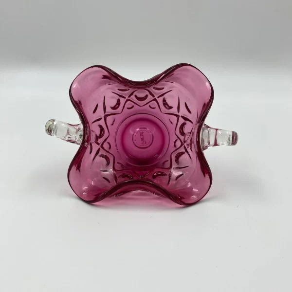 pink glass bowl on side