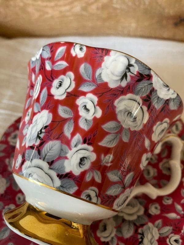 Royal Albert tea cup and saucer fuchsia and grey silver chintz pattern close up of tea cup