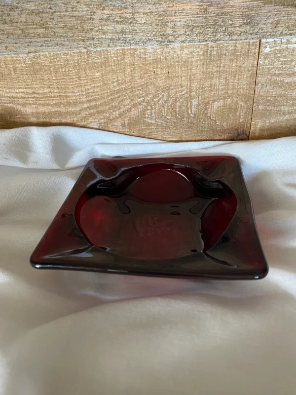 Red glass ashtray vintage 1970s ruby red closeup 2