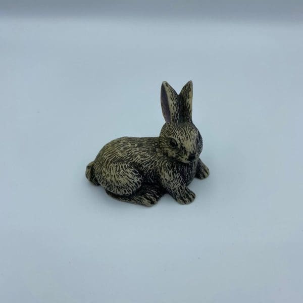 vintage soapstone carvings front of bunny rabbit