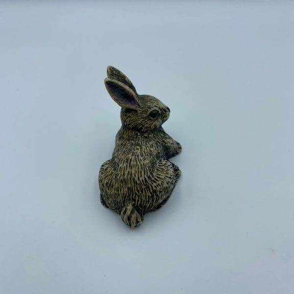 vintage soapstone carvings close to show detail of bunny rabbit