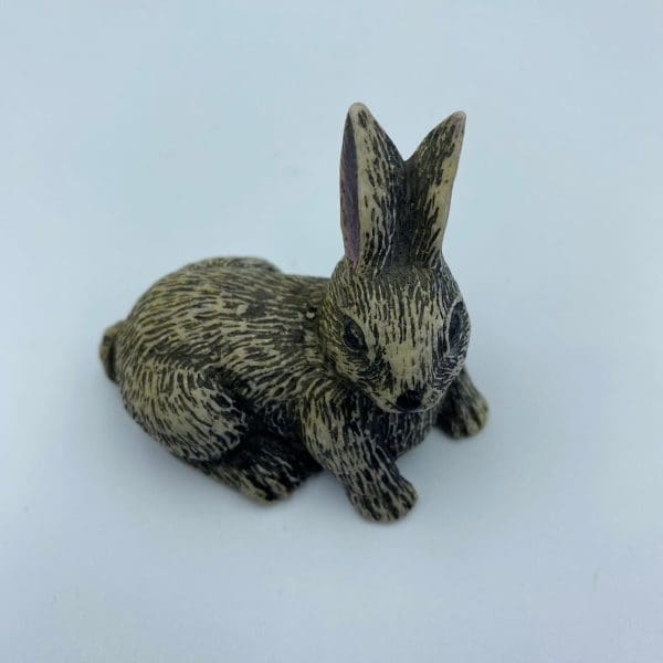 vintage soapstone carvings close of bunny rabbit face