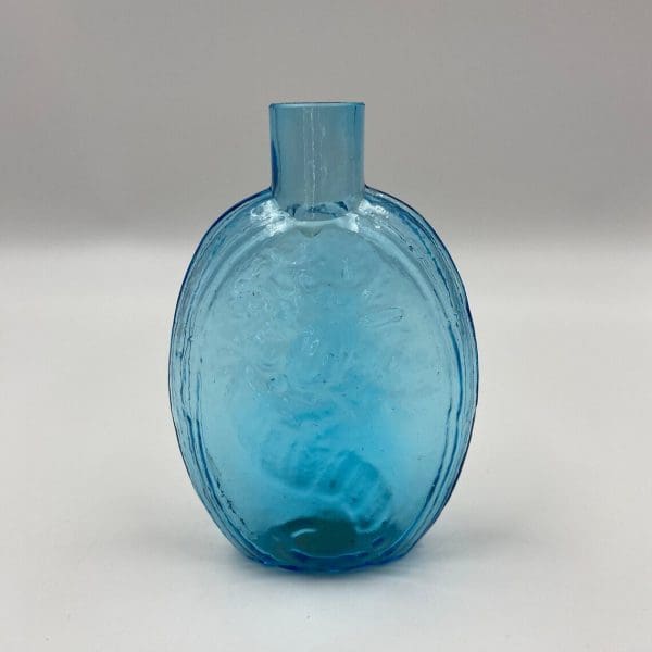 antique blue glass bottles back