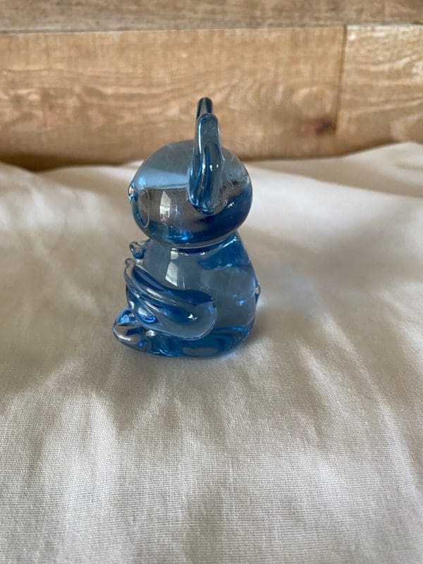 koala bear figurine left side blue glass