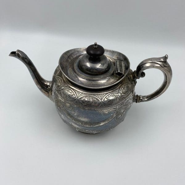 silver plate tea pot embossed from the 1880s Thomas Otley top