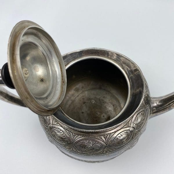 silver plate tea pot embossed from the 1880s Thomas Otley inside