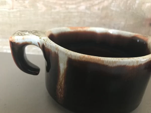 vintage USA pottery close to unconnected handle on creamer