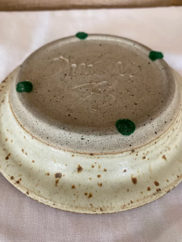 Vintage pottery ashtray signed Owens 1978 brown and beige bottom close up two showing felt circles