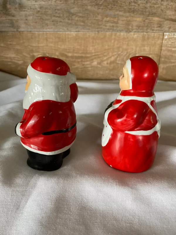 Vintage Christmas salt and pepper shakers Santa Claus and Mrs. Claus facing left