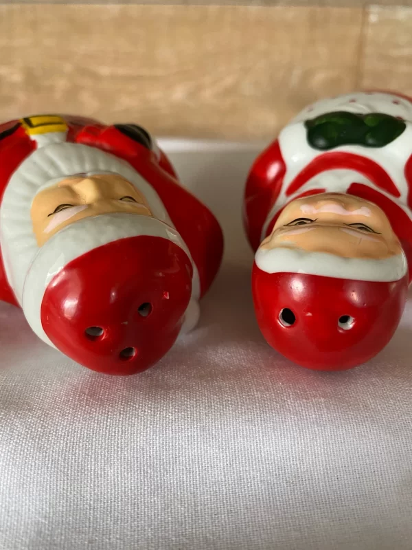 Vintage Christmas salt and pepper shakers Santa Claus and Mrs. Claus top