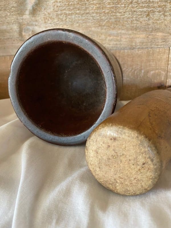 vintage wood mortar and pestle inside and wear