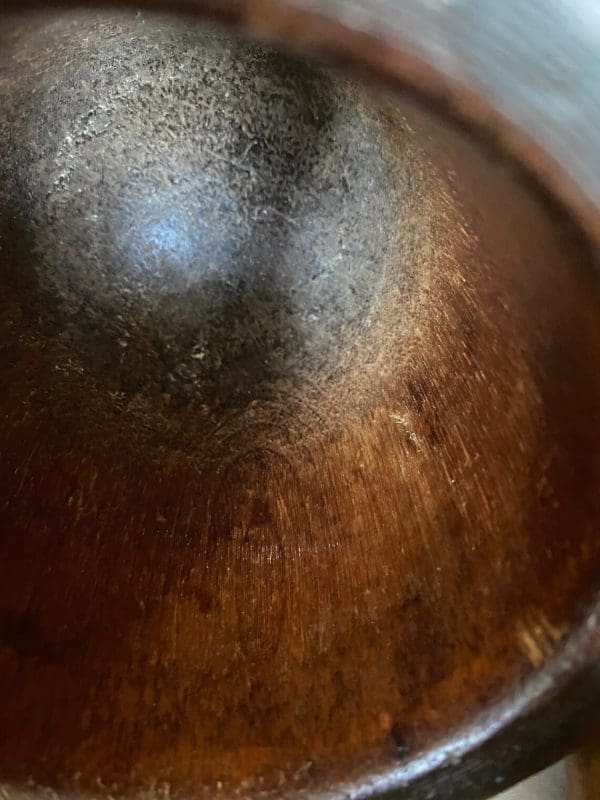 vintage wood mortar and pestle close detail of wood grain