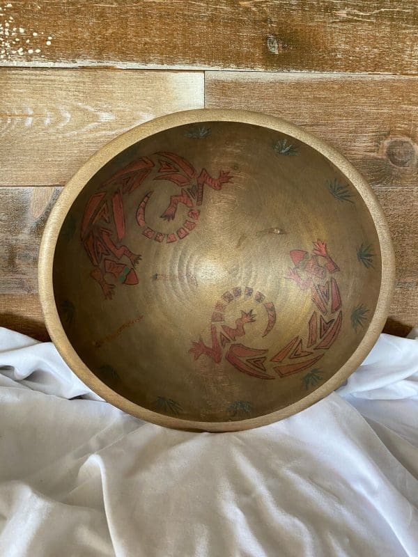 Painted wooden bowls with lizard inside