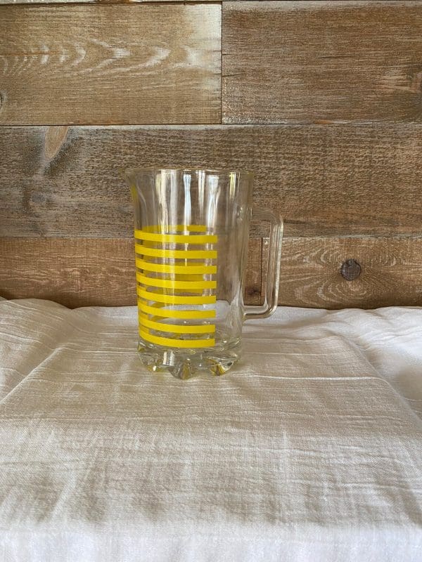 Italian glass pitcher clear glass yellow stripe left side